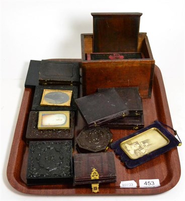 Lot 453 - A group of 19th century portrait photographs, some in union cases; together with a patheorama...