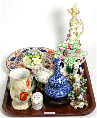 Lot 462 - A floral encrusted porcelain ewer, a pair of small candlesticks, oriental blue and white vase...