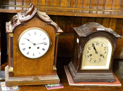 Lot 469 - A mahogany inlaid striking table clock