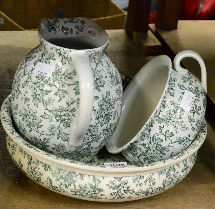 Lot 1035 - A transfer printed toilet set; together with a Rolanda Heimer dolls and a Pauline's limited edition