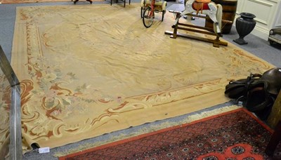 Lot 1103 - An Aubusson weave carpet, China, the corn field centred by an oval floral panel framed by...