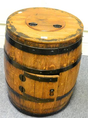 Lot 1122 - A coopered barrel or churn, with later hinged top