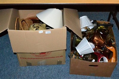 Lot 1142 - Two boxes of metal wares including copper kettles, brass lamps and kichenelia