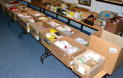 Lot 1143 - A large quantity of doll making equipment and components including doll parts, wigs, paints, moulds