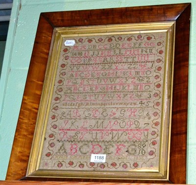 Lot 1188 - 19th century alphabet sampler, worked by Ann Campbell, 1830 in pink and green threads, within a...