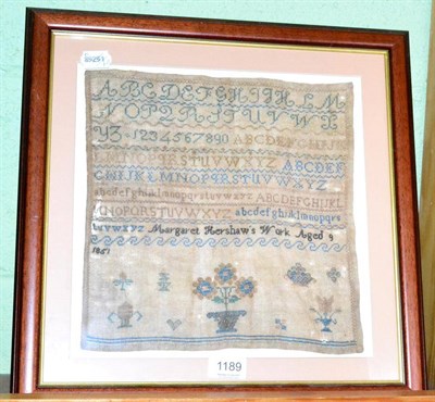 Lot 1189 - A framed alphabet sampler, worked by Margaret Hershaw, aged 9, dated 185(6)1, with decorative...
