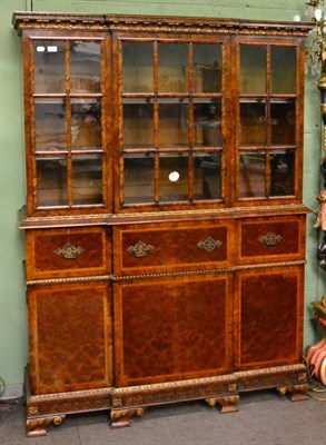 Lot 1224 - A large 20th century walnut bookcase