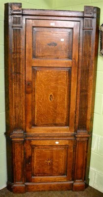 Lot 1229 - A George III oak cupboard