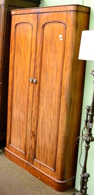 Lot 1232 - A Victorian mahogany two drawer wardrobe