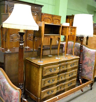 Lot 1243 - Two mahogany tripod standard lamps