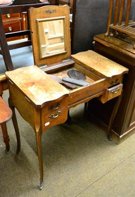 Lot 1249 - A French dressing table with triple hinged top and brushing slide