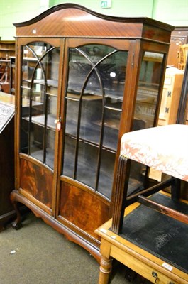 Lot 1253 - An early 20th century glazed display cabinet on cabriole supports