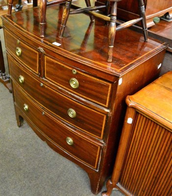 Lot 1257 - A string inlaid three height bow fronted mahogany chest of drawers