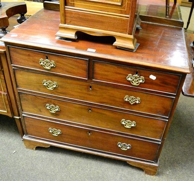 Lot 1261 - A George III mahogany four height chest of drawers on bracket feet