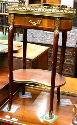 Lot 1263 - A kidney shaped side table with gallery marbled top