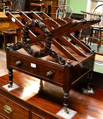 Lot 1265 - A mahogany Canterbury with single drawer on turned supports and a small rectangular mahogany mirror