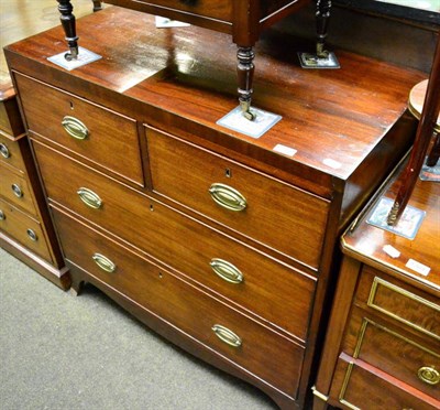 Lot 1266 - A 19th century three height chest of drawers on swept bracket feet