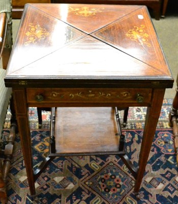 Lot 1271 - An Edwardian marquetry inlaid rosewood envelope card table