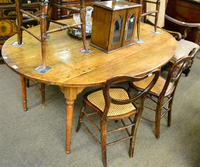 Lot 1274 - French 18th century chestnut drop leaf dining table