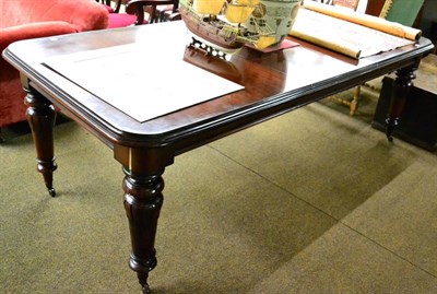 Lot 1280 - A mahogany extending dining table on heavy turned supports, bearing brass plaque 'Osborne House'