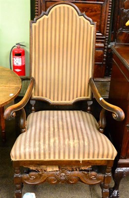 Lot 1283 - A walnut framed armchair in striped fabric