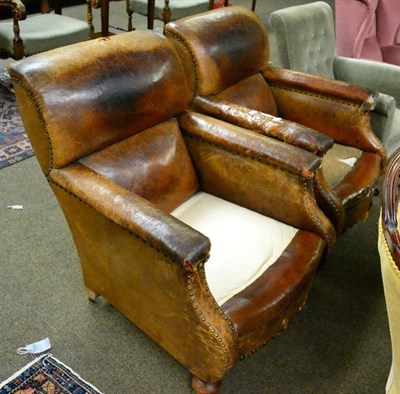 Lot 1285 - A pair of leather club chairs (a.f.)