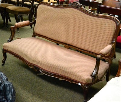 Lot 1294 - A French show frame sofa with carved detail