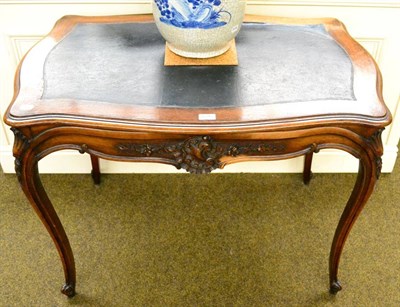 Lot 1295 - A French mahogany bureau plat