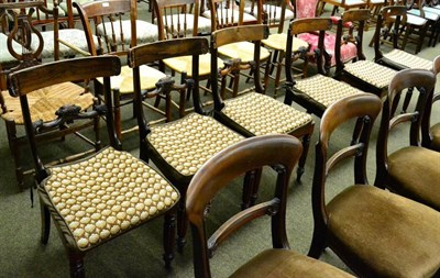 Lot 1300 - A set of six William IV rosewood dining chairs with cane seats and fluted front supports
