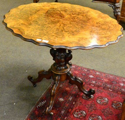 Lot 1307 - A Victorian walnut tilt-top table