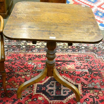 Lot 1310 - A square oak tilt top tripod table