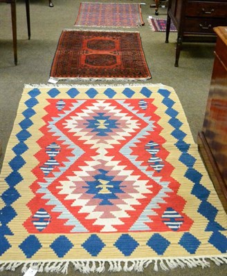 Lot 1313 - Afghan rug, the rust field with two elephant foot medallions enclosed by multiple borders, 140cm by