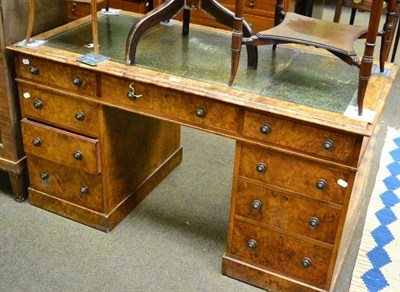 Lot 1314 - A Victorian walnut twin pedestal desk with inset leather top