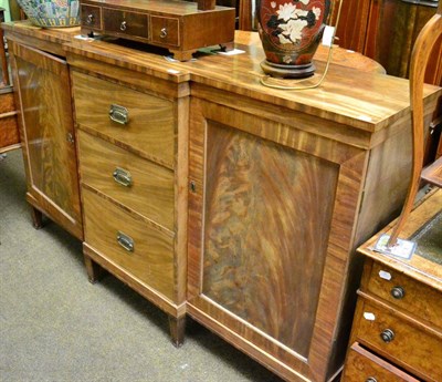 Lot 1316 - A 20th century mahogany break front bookcase