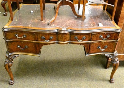 Lot 1318 - A French walnut desk