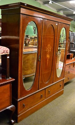 Lot 1322 - An Edwardian string inlaid three section wardrobe together with a similar dressing table