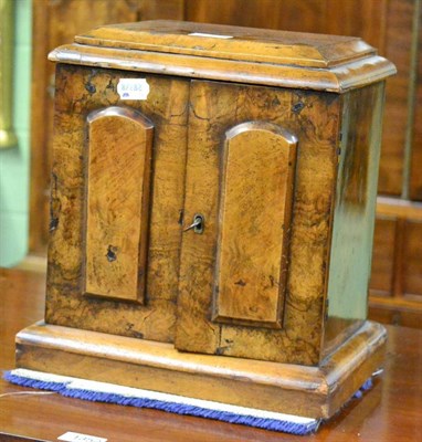 Lot 1351 - A walnut three drawer miniature chest