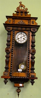 Lot 1362 - A regulated wall clock with decorative case