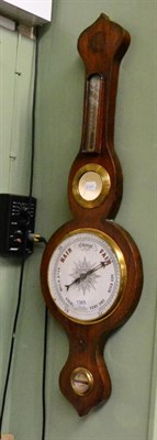 Lot 1365 - A wheel barometer