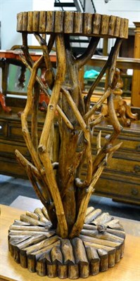 Lot 1371 - A plant stand of naturalistic form