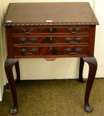 Lot 1375 - A Georgian style mahogany canteen with plated contents