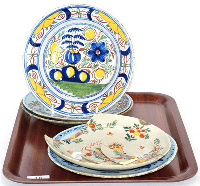 Lot 16 - A collection of 18th century Delftware plates, polychrome, blue and white, some damage (5)