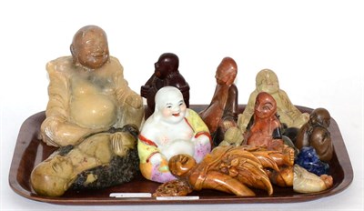 Lot 27 - Collection of 19th century and later stone, hardwood and ceramic Buddhas