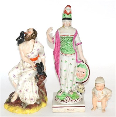 Lot 32 - A Staffordshire Pearlware figure of Minerva; together with Elijah and the ravens; and a bisque baby