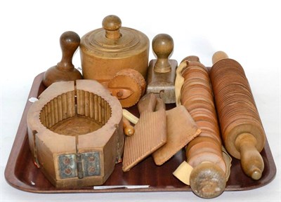 Lot 41 - A group of 19th century butter and shortbread moulds, rolling pins, etc