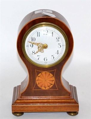 Lot 42 - An Edwardian inlaid balloon shaped mantel timepiece