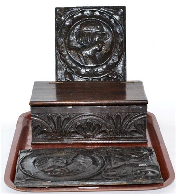 Lot 56 - Two small carved oak panels and a carved oak box