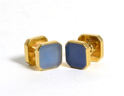 Lot 62 - A pair of chalcedony set cufflinks, octagonal blue chalcedony plaques in rubbed over settings,...