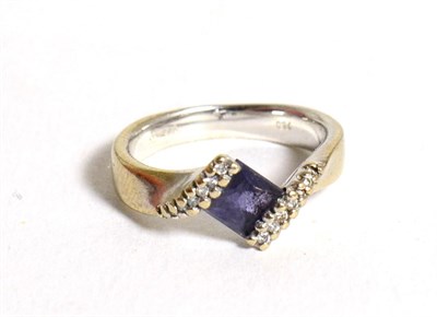 Lot 72 - An 18 carat white gold iolite and diamond twist ring, a square cut iolite in a pavé set...