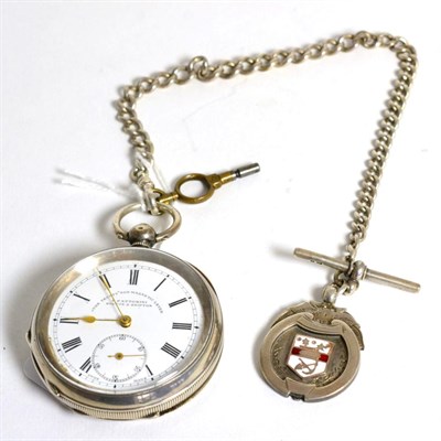 Lot 73 - A silver open face pocket watch retailed Fattorini, with curb linked chain and attached silver...